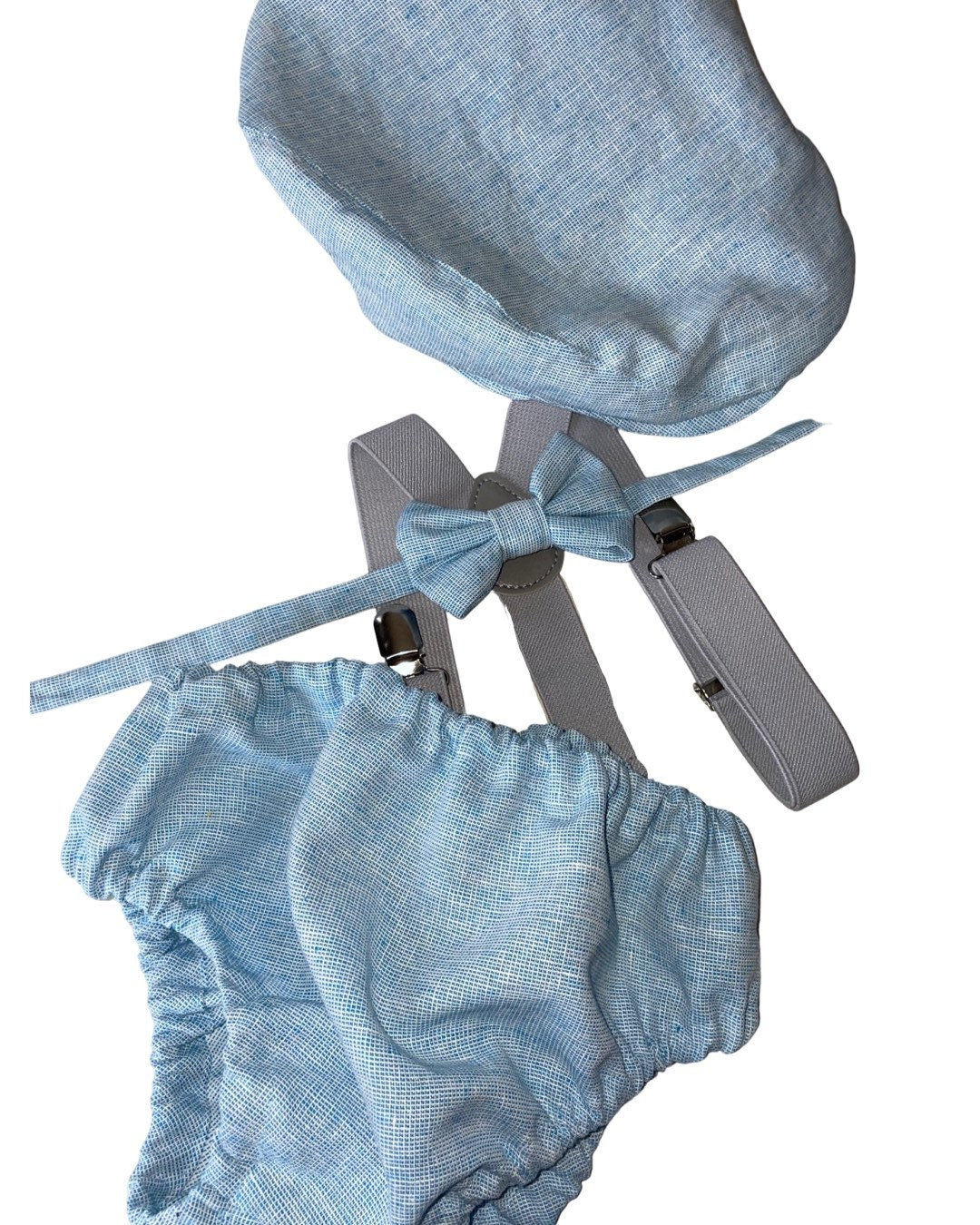 Light denim blue cake smash set for first birthday. Flat cap. Bow tie. Suspenders. Bloomer