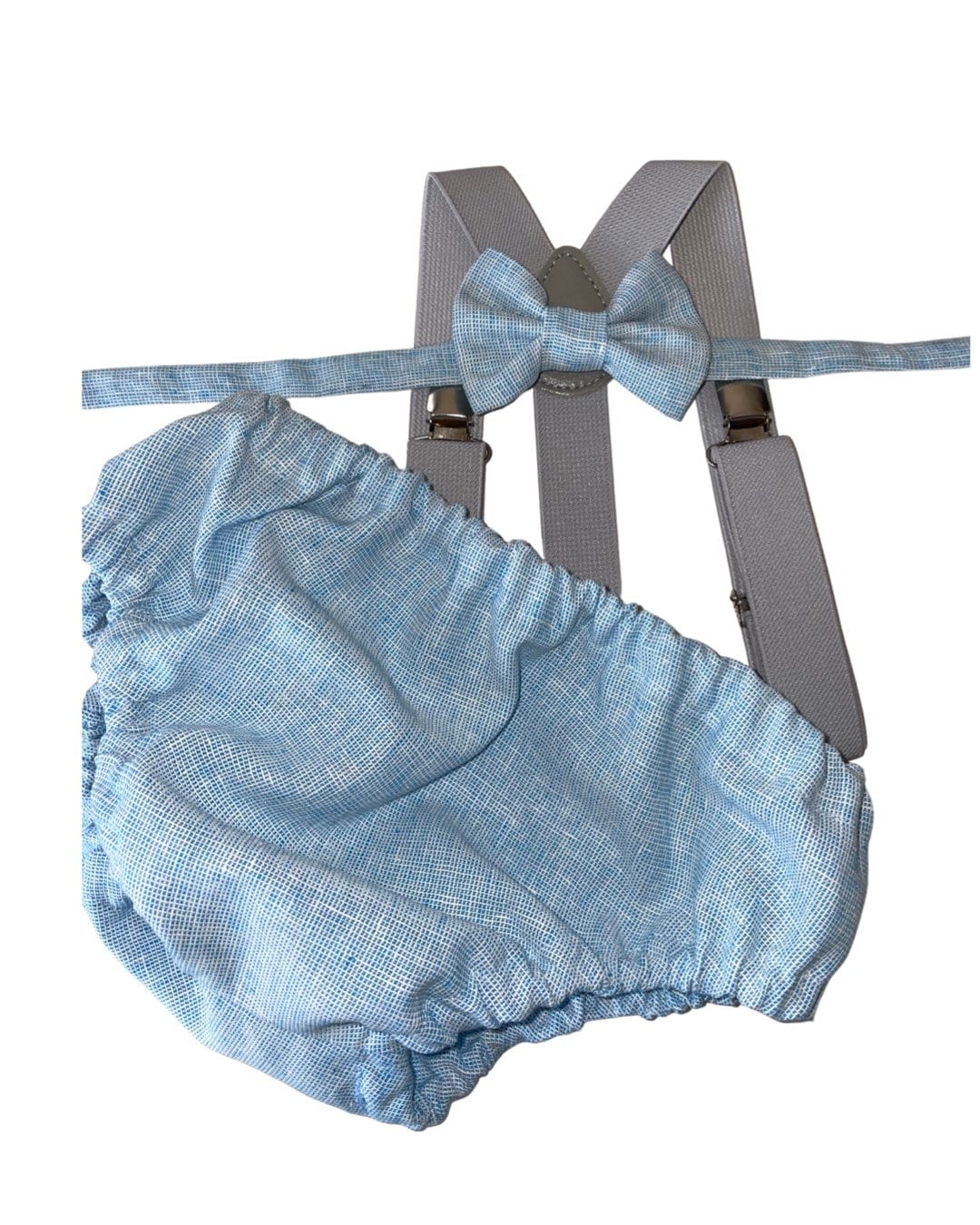 Light denim blue cake smash set for first birthday. Flat cap. Bow tie. Suspenders. Bloomer