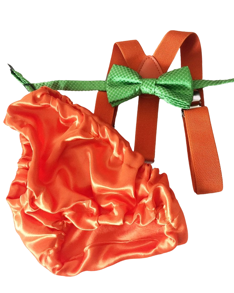 an orange purse with a green bow tied to it
