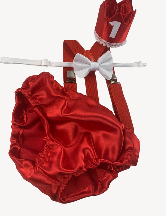 a red satin diaper with a white bow tie