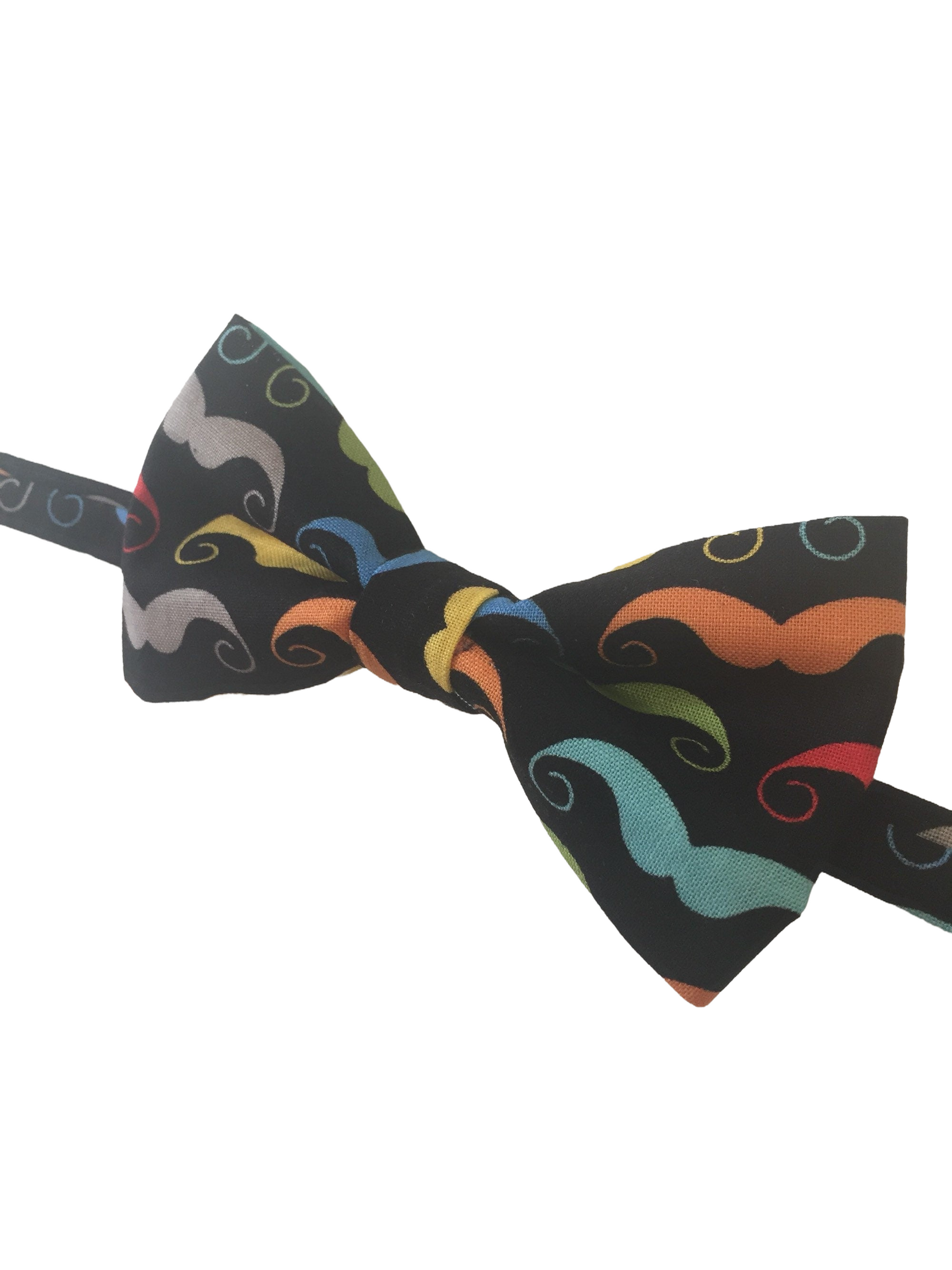 a black bow tie with mustaches on it