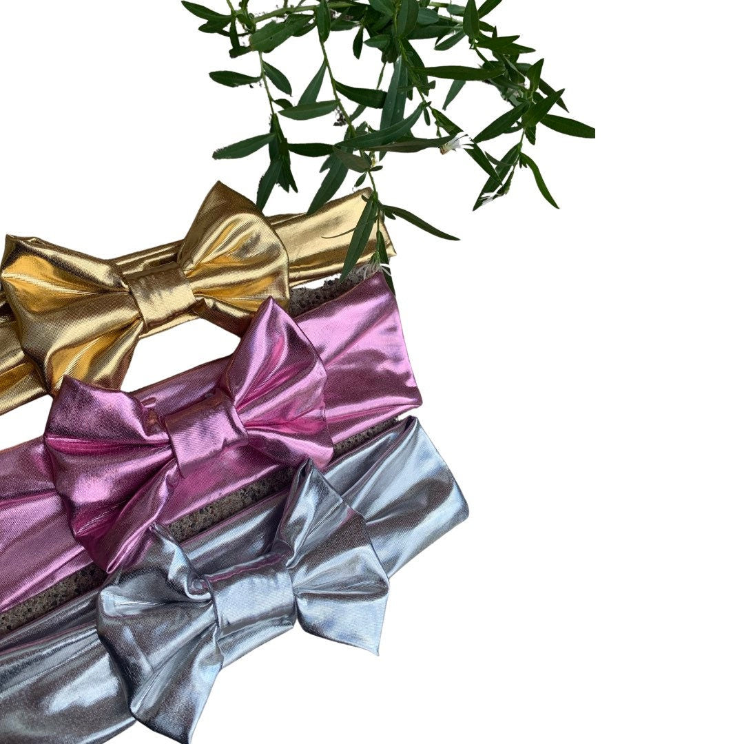 Metallic holiday bows in a rainbow of colours